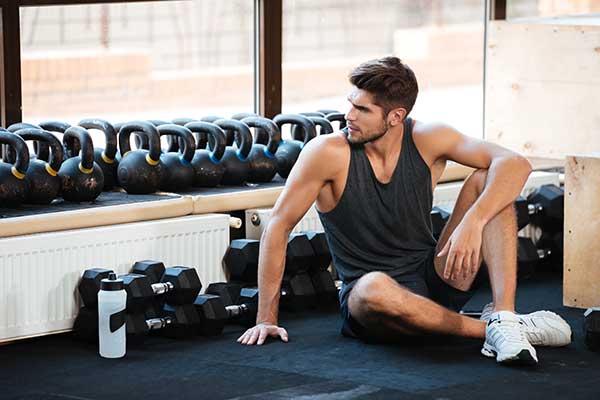 How to Properly Do Dumbbell Bicep Curls Using an Incline Bench